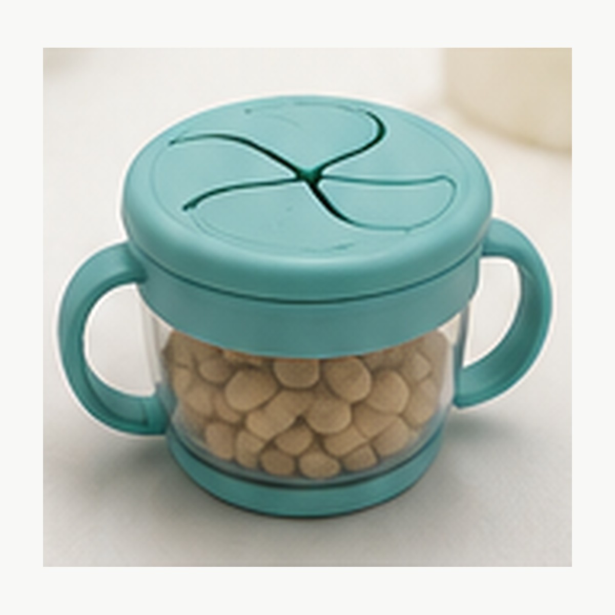 Illustrative image of a handled toddler snack cup
