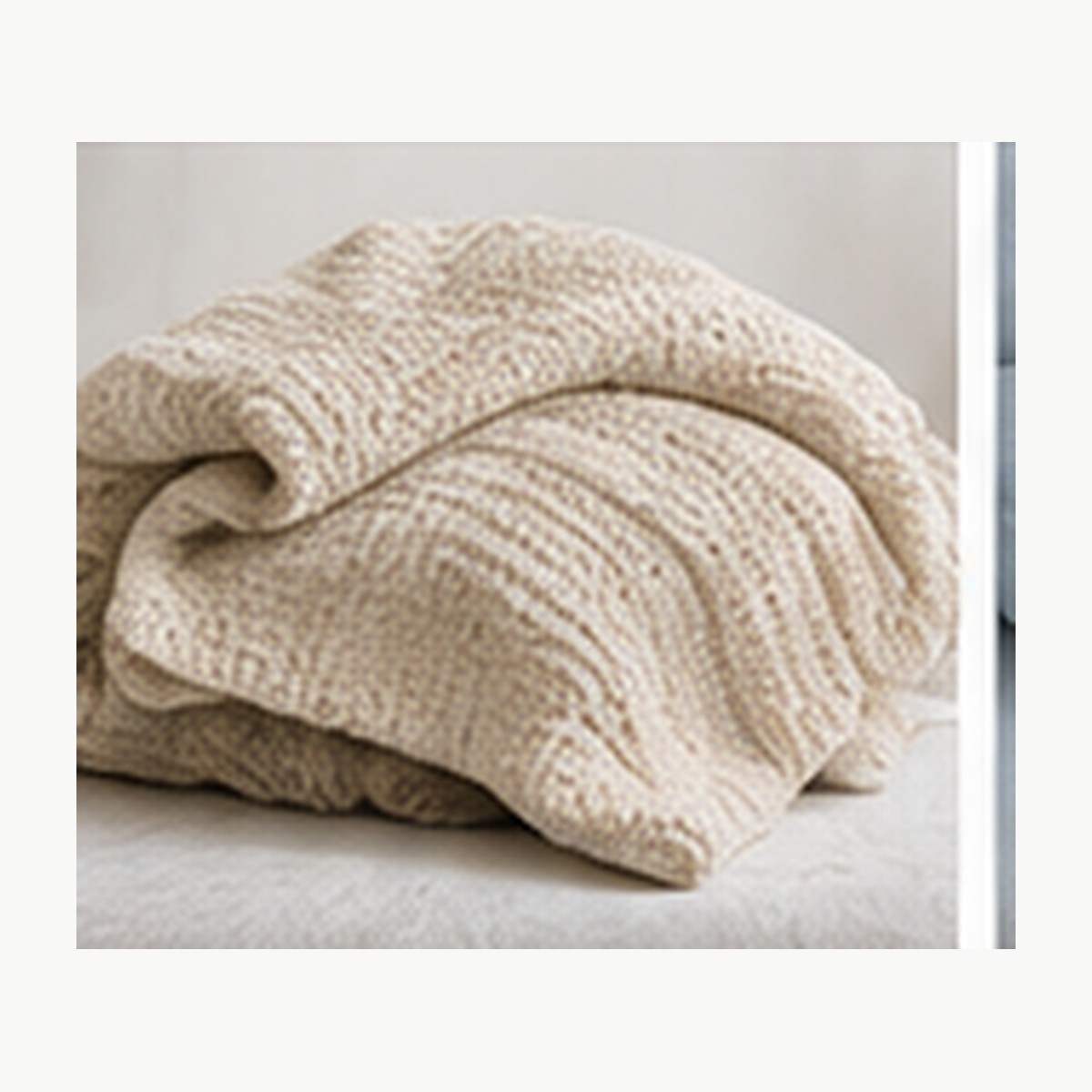 Illustrative image of a folded soft throw blanket