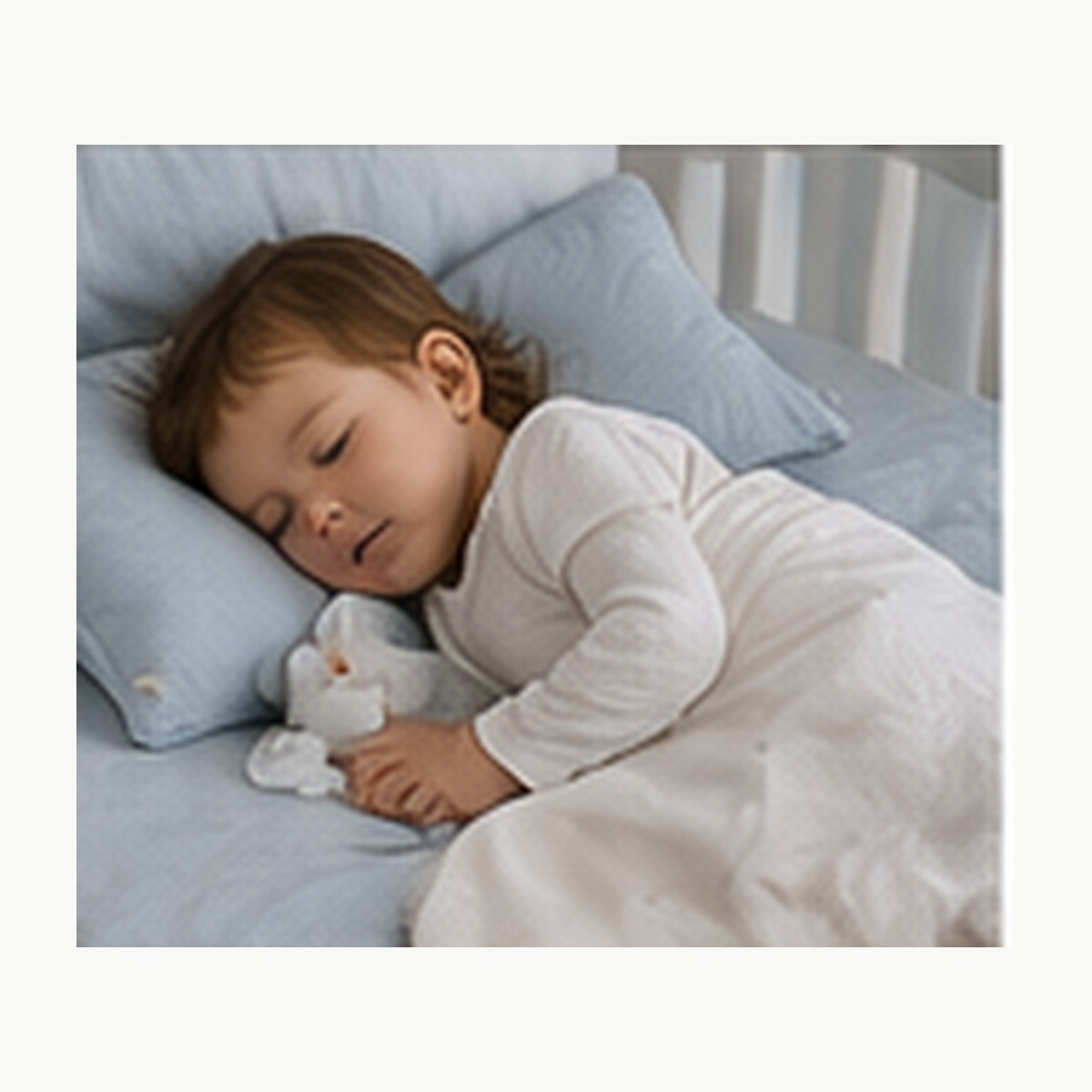 Illustrative image of a toddler resting on a nap mat