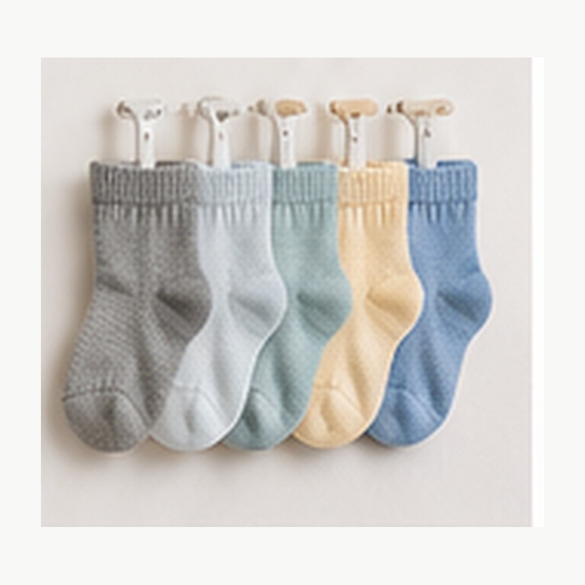 Illustrative image of several pairs of toddler socks